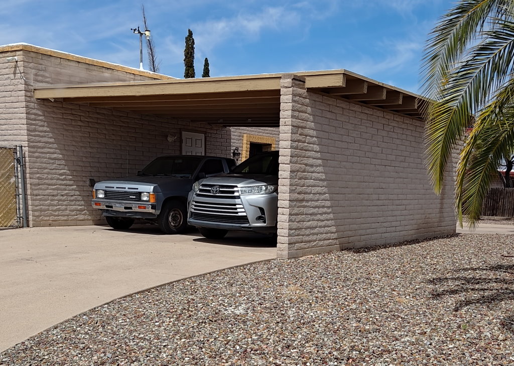 Enclosed-side carport